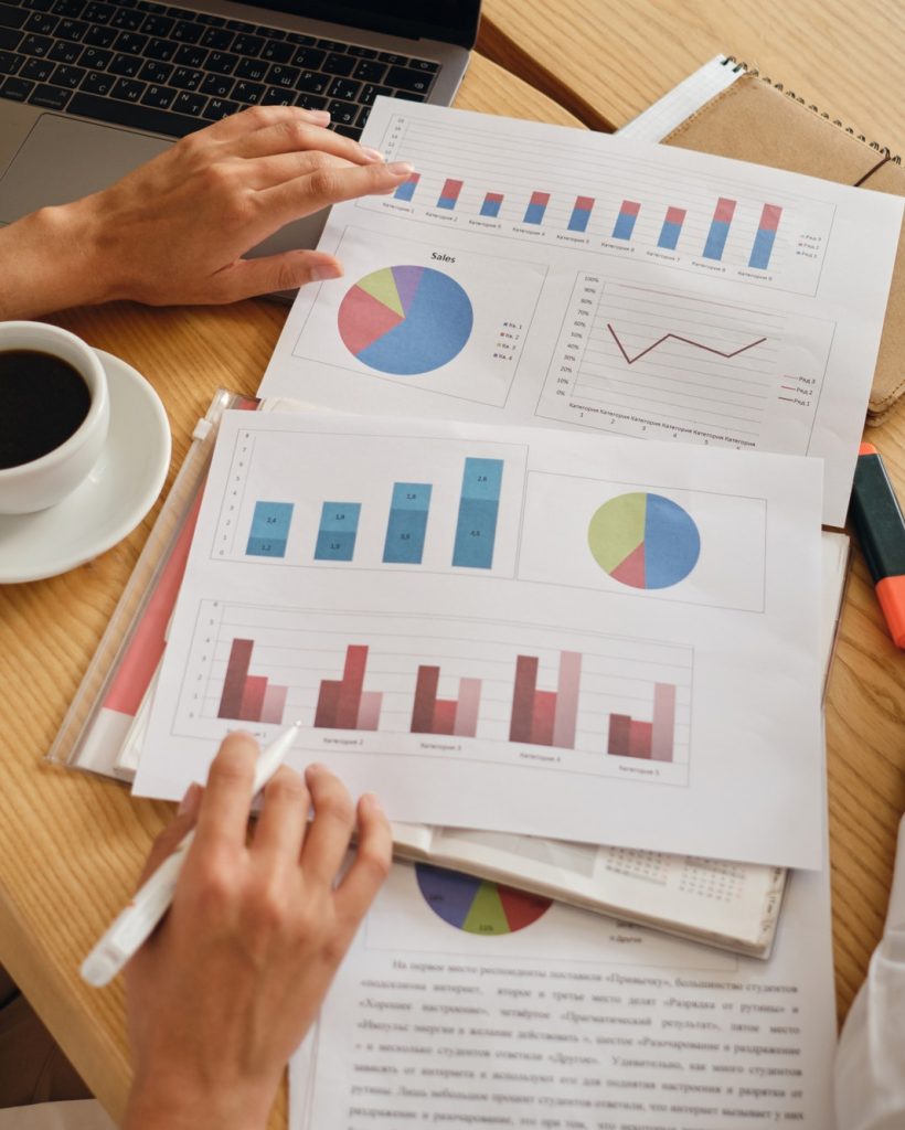 close-up-business-colleagues-working-on-new-project-with-diagrams-in-modern-office.jpg